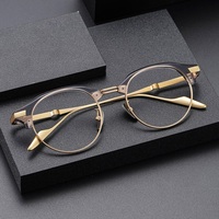 Nouveautés 0080 : Montures de lunettes rétro de haute qualité en acétate et titane pour lunettes optiques. Vente en gros de haute qualité.