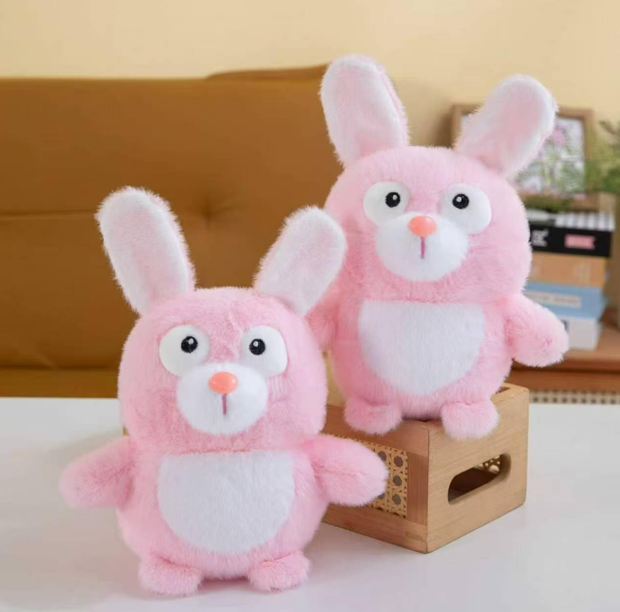 チャーミングで心地よい大きなピンクのぬいぐるみウサギは、お子様の