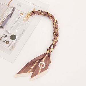 Porte-clés en soie attrayants pour femmes, ornements de sac à main, porte-clés de voiture, commande en gros - Product Image 1