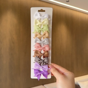 Lot de 10 pinces à cheveux promotionnelles pour bébés, nœuds en ruban de couleur unie, faits à la main pour petites filles - Product Image 4