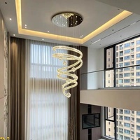 Luminaire suspendu professionnel personnalisé en cristal K9 en forme de double spirale LED pour escalier duplex, villa, salon