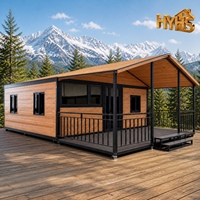 Maison modulaire personnalisée de 20 pieds avec cadre noir, style pavillon à toit incliné, assemblage rapide en extérieur, maison conteneur pliable extensible