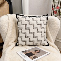 Coussin décoratif jacquard en chenille nordique à motifs abstraits, style moderne et minimaliste, tricoté