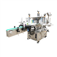 Machine d'étiquetage automatique double face auto-adhésive pour bouteilles plates