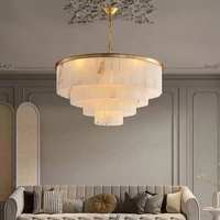Luminaire suspendu moderne de luxe minimaliste en marbre doré Grand lustre rond en laiton et albâtre pour le salon et le mariage