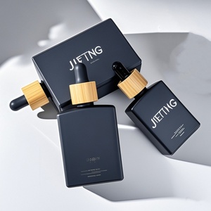 Stock 50ml Square Empty Essential Beard Oil <b>Flat</b> Shoulder Rectangular Frost Black Glass Dropper Bottle with Bamboo Dropper Cap - Product Image 1