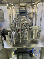 Machine de remplissage de seringues automatique pneumatique à commande PLC pour pommades vétérinaires, applications chimiques et cosmétiques, garantie 1 an