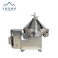 Petite centrifugeuse à disques pour la séparation du lait écrémé, avec capacité de séparation en deux phases