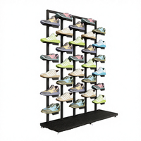 Support d'affichage de chaussures de sport en fer pliable et rotatif à une face, pour magasins de chaussures commerciaux, avec un design moderne et léger