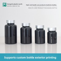 Bouteille d'emballage alimentaire santé 120 cc, design cylindrique noir, bouchon double ligne argenté, idéale pour capsules et poudres, petite taille