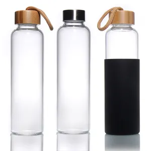Популярная небьемая прозрачная стеклянная бутылка для воды с кожаным рукавом