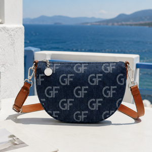 กระเป๋าผู้ชายแบบสะพายข้างทรงครึ่งวงกลมผ้ายีนส์ พร้อมช่องใส่กระเป๋าสตางค์ สายปรับได้ เหมาะสำหรับเดินทางและใช้งานทั่วไป - Product Image 1