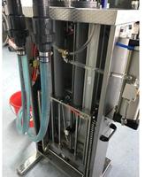 Remplisseuse de liquide corrosif à double tête pour nettoyeur de toilette Harpic Machine de remplissage de liquide de bouteille