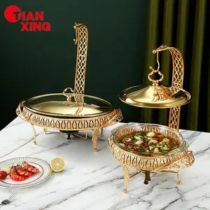 Platos de frotamiento de vidrio de alta calidad de lujo Tianxing, plato de Cheffing, calentador de alimentos, forma de huevo de Metal, plato de frotamiento dorado, juego de Buffet