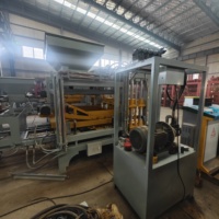 Presse hydraulique QT4-15 pour la fabrication de briques en ciment, de blocs de route et de produits de maçonnerie en béton