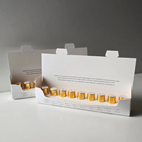 Boîte cadeau de luxe avec logo personnalisé en feuille d'or, vernis UV sélectif, finition mate, taille sur mesure pour coffret découverte de parfums
