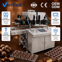 Déposeuse de chocolat semi-automatique pour la production d'échantillons, idéale pour les petites chocolateries, pralines, truffes et bonbons fourrés CE