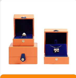 Elegante Caja de Joyería de Cuero Naranja y Azul, Caja de Almacenamiento de Viaje de PU Personalizada de Lujo con Botón para Anillos, Pendientes, Colgantes y Brazaletes - Product Image 1