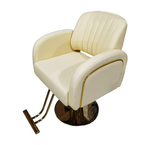 Chaise <span class=keywords><strong>de</strong></span> barbier <span class=keywords><strong>de</strong></span> luxe en cuir crème avec accents dorés, chaise <span class=keywords><strong>de</strong></span> salon hydraulique pour <span class=keywords><strong>studio</strong></span> <span class=keywords><strong>de</strong></span> <span class=keywords><strong>coiffure</strong></span> - Product Image 1
