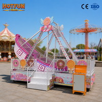Bateau pirate en fibre de verre rose charmant pour 12 personnes, à vendre pour les parcs d'attractions en plein air et les attractions de carnaval