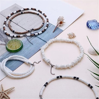 Mode en gros nouveau blanc coquille bijoux hommes coquillage été plage surfeur collier hawaïen pour hommes femmes