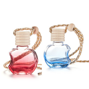 Flacon diffuseur de parfum suspendu pour voiture, en verre transparent de 10 ml, vide, en forme de pomme plate et colorée - Product Image 1