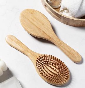 En stock al por mayor Cepillo para el cabello de bambú natural, tipo pala portátil con mango de madera y peine de masaje con almohadilla de aire - Product Image 4