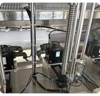 Machine de remplissage et de bouchage automatique à grande vitesse de 1 à 5 L pour plusieurs types de bouteilles, avec suivi de la température