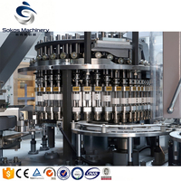 Machine Combi-Block Automatique Sokos pour le Remplissage et le Bouchage de Bouteilles d'Eau Minérale - Usine d'Embouteillage d'Eau Pure