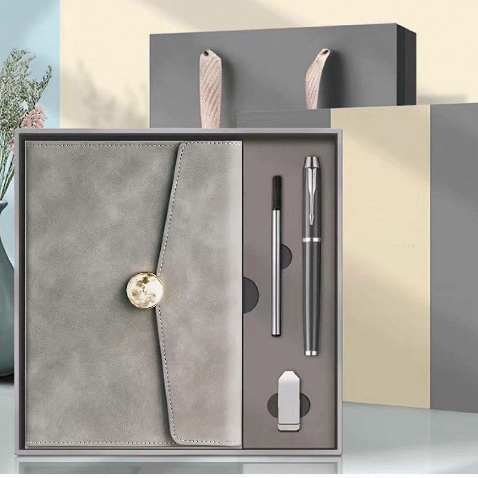Notebook + Pen + Pen refill + USB drive