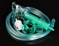 Masque d'oxygénation en PVC vert avec bordure souple, emballage individuel scellé pour les personnes souffrant d'inconfort respiratoire