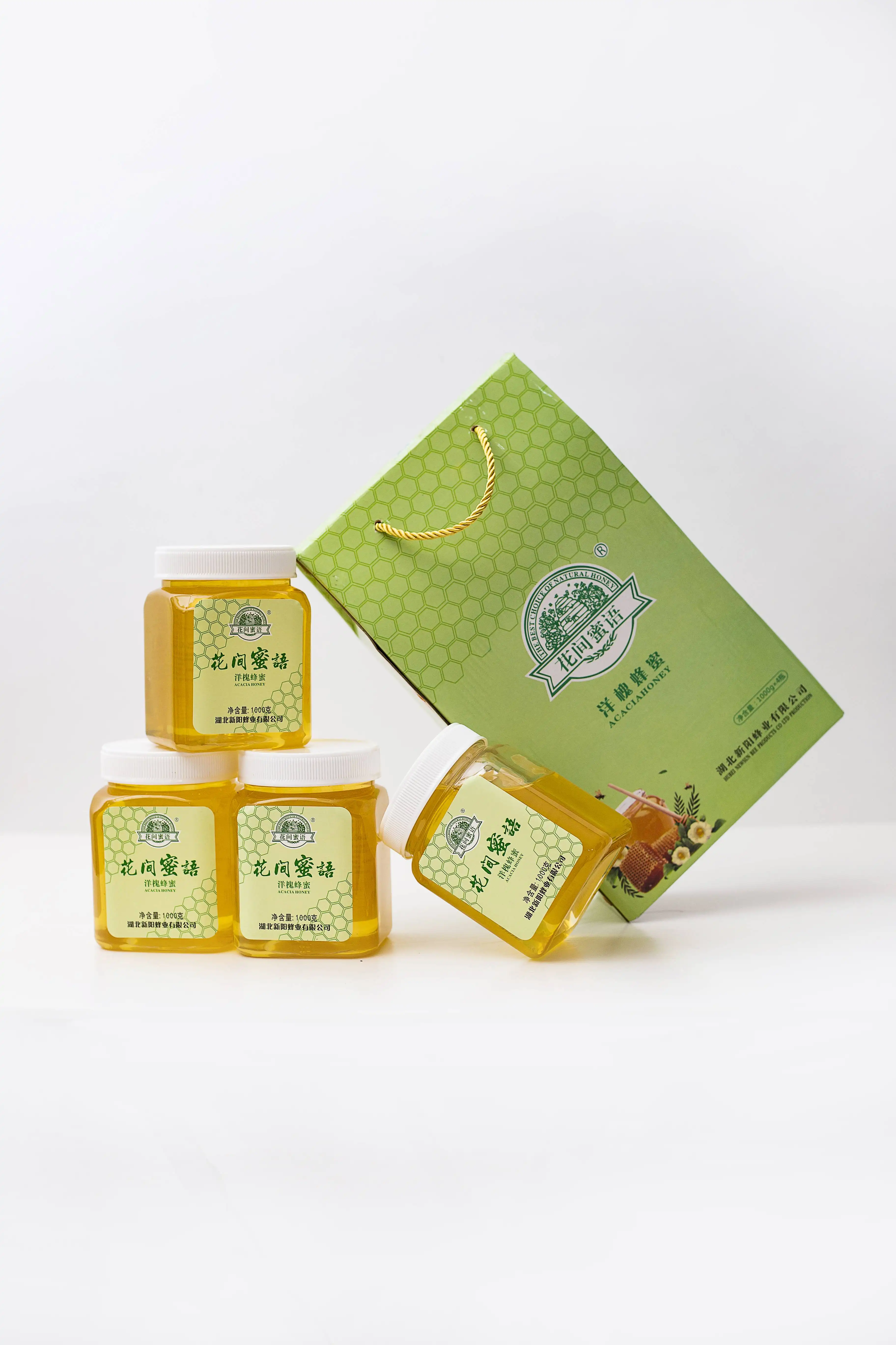 ボトルまたはドラムの健康食品に詰められた菜種とアカシアの白色の100% 中国の純粋な天然蜂蜜のサンプル