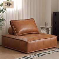 Canapé modulaire en cuir marron cognac, quatre pièces, en forme de L, avec assise capitonnée à grille et coussin de soutien, pour salon et appartement