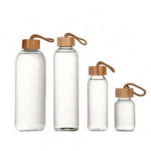 Bouteille d'eau en verre écologique sans BPA avec couvercle en bambou pour les voyages et la salle de sport - Product Image 1