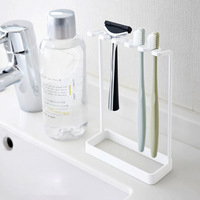 Support mural de rangement pour salle de bain en métal, style japonais minimaliste, design évidé, non pliable, pour brosses à dents