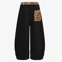 Pantalon de survêtement ample noir style Y2K avec imprimé léopard et détail de patch bas, tendance, coupe oversize, style urbain, écologique, pour la détente
