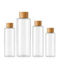 Bouteille en plastique transparente givrée PET rechargeable de 3 oz/4 oz/5 oz/6 oz/8 oz avec logo personnalisé et bouchons en bambou