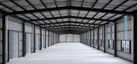 Entrepôt en structure métallique SHENG YUE 85m x 20m avec matériaux Q235/Q355 et solutions de conception de modèles 3D