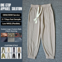 Pantalon de jogging homme beige côtelé avec cordon de serrage, taille élastique, coupe fuselée décontractée, poches plaquées, style streetwear, vente en gros, personnalisable OEM