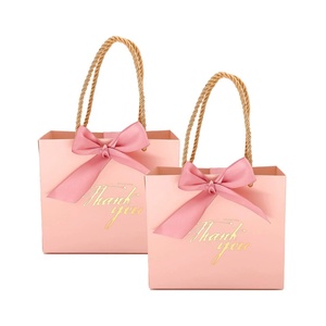 Wholesale Best Selling Custom Logo High Quality Clothing Packaging Jewelry Paper <b>Gift</b> <b>Bag</b> Customized <b>Gift</b> Box With Ribbon Handle - Product Image 1