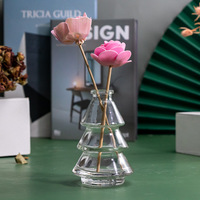 Bouteille de diffuseur en verre de parfum de bâtons de roseau de 100ml en forme d'arbre de Noël pour la décoration intérieure