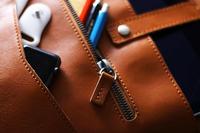 Sac organisateur en cuir de haute qualité pour tablettes, sacs à outils en cuir à faible MOQ, organisateur en cuir pour les voyages