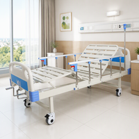 Lit d'hôpital manuel à roulettes double face, garde-corps en alliage d'aluminium, plateau profilé en C, panneau ABS pour clinique communautaire