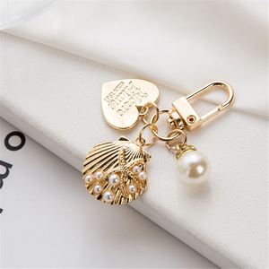 Factory Directly Sales Mini Cute Creative Metal Shell <b>Key</b> <b>Chains</b> for Beach Souvenirs and Bag Pendants and Small Gifts - Product Image 5