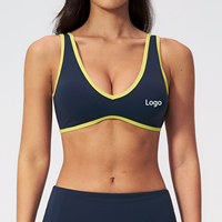 Soutien-gorge de sport respirant effet seconde peau avec couleurs contrastées et coussinets amovibles, idéal pour le Pilates, le yoga et le fitness, anti-transpiration pour femme