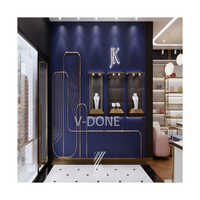 Luxuriöse Lederwaren-Vitrine Maßgefertigte Goldmetall-Glasvitrine für Handtaschen- und Schuhgeschäfte Inneneinrichtung
