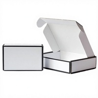 Boîte plate en carton ondulé rigide noir avec logo personnalisé, recyclable, pour l'expédition de bougies, avec doublure en éponge