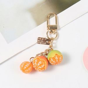 Accessoires de pendentif porte-clés en résine, motif fruit de mandarine, style dessin animé pastoral, mignons et simples, pour sacs d'école, téléphones et écouteurs - Product Image 6