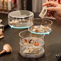 Boîte de rangement à bijoux multifonctionnelle en plastique transparent rotative et anti-poussière pour épingles à cheveux, boucles d'oreilles et bagues