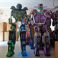 Guangzhou Enjoyment Accessoires de costume personnalisés pour performance sur échasses pour adultes, avec robot LED lumineux, pour discothèque, carnaval et fête
